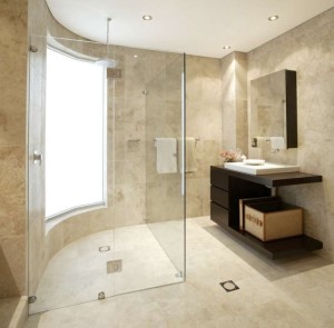 Clear glass around shower makes bathroom appear larger